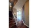 Inviting entryway features hardwood floors, a staircase, and an open floor plan at 3324 Peachtree Ne Rd # 3001, Atlanta, GA 30326