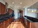 Spacious kitchen with dark cabinetry, stainless steel appliances, and hardwood floors at 3324 Peachtree Ne Rd # 3001, Atlanta, GA 30326