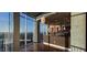Gourmet kitchen featuring dark cabinetry, granite countertops, pendant lighting and a stunning view from large windows at 3324 Peachtree Ne Rd # 3001, Atlanta, GA 30326