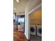 View of the kitchen leading into the laundry room with a washer and dryer at 3324 Peachtree Ne Rd # 3001, Atlanta, GA 30326