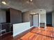 Open living area boasts hardwood floors, neutral walls, and modern lighting at 3324 Peachtree Ne Rd # 3001, Atlanta, GA 30326