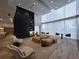 Spacious living area with comfortable seating, large windows, and modern design for relaxation and socializing at 3324 Peachtree Ne Rd # 3001, Atlanta, GA 30326