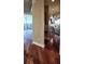Open-concept living space featuring hardwood floors, large windows and views of the kitchen area at 3324 Peachtree Ne Rd # 3001, Atlanta, GA 30326