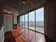 Bright living room with floor-to-ceiling windows offering stunning views and ample natural light at 3324 Peachtree Ne Rd # 3001, Atlanta, GA 30326