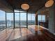 Bright living room featuring hardwood floors, floor to ceiling windows and spectacular views at 3324 Peachtree Ne Rd # 3001, Atlanta, GA 30326