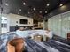Modern lounge area featuring plush seating, stylish decor, and a sleek entertainment center for community gathering at 3324 Peachtree Ne Rd # 3001, Atlanta, GA 30326