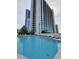 Stunning rooftop pool with city views and ample lounge seating for relaxation and enjoyment at 3324 Peachtree Ne Rd # 3001, Atlanta, GA 30326