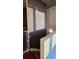 Modern staircase with wood steps and white railing leading to the upper level of the home at 3324 Peachtree Ne Rd # 3001, Atlanta, GA 30326