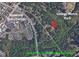 Aerial view of property location in relation to Suwanee Town Center, George Pierce Park, and Suwanee Creek Greenway Trail at 3781 Cherokee Trl, Suwanee, GA 30024