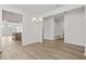 Open-concept dining area with hardwood floors, seamlessly connecting to the kitchen and living spaces at 1682 Juniper Berry Way, Loganville, GA 30052