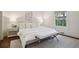 A cozy bedroom featuring a neutral color palette, soft lighting, and a comfortable bed at 2672 Birchwood Dr, Atlanta, GA 30305