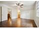 Bedroom with hardwood floors, natural light, and adjacent full bathroom at 2672 Birchwood Dr, Atlanta, GA 30305