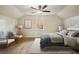 Comfortable bedroom featuring a ceiling fan and view of the outside at 2672 Birchwood Dr, Atlanta, GA 30305