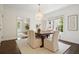 A dining room with neutral tones complemented by natural light creates an inviting space at 2672 Birchwood Dr, Atlanta, GA 30305