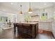 This kitchen boasts a spacious island, modern lighting, and sleek finishes for a contemporary feel at 2672 Birchwood Dr, Atlanta, GA 30305