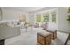 Bright living room with large windows, neutral furnishings, and modern decor at 2672 Birchwood Dr, Atlanta, GA 30305