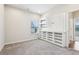 Bedroom features large custom storage with drawers, shelving, and a built in desk at 306 Lark Ln, Canton, GA 30115