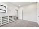 Bedroom features a built-in shelving unit with drawers and access to another room at 306 Lark Ln, Canton, GA 30115