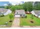 Charming single-Gathering home featuring stone accents, a two-car garage, and a well-maintained front yard at 306 Lark Ln, Canton, GA 30115