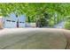 Spacious two-car garage and large driveway providing ample parking space at 3116 Lakepoint Cir, Acworth, GA 30102