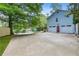 Spacious two-car garage and large driveway providing ample parking space at 3116 Lakepoint Cir, Acworth, GA 30102