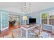 Comfortable home office featuring hardwood floors and large windows at 3116 Lakepoint Cir, Acworth, GA 30102