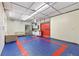 Spacious room with blue floors, ample counter space, sofas, and a drop ceiling at 3116 Lakepoint Cir, Acworth, GA 30102