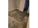 Basement area with exposed block wall and tile floor at 6 Rockmart Sw Dr, Atlanta, GA 30314