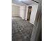 Unfinished basement area with concrete block walls and old tile floor at 6 Rockmart Sw Dr, Atlanta, GA 30314