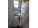 Bathroom with tile flooring, a tub, and a window providing natural light at 6 Rockmart Sw Dr, Atlanta, GA 30314