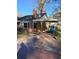 Rear view of the brick home with covered parking at 6 Rockmart Sw Dr, Atlanta, GA 30314