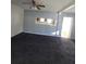 Open living room with neutral walls and ample light at 6 Rockmart Sw Dr, Atlanta, GA 30314