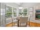 Cozy dining area with a view of the backyard, stainless appliances nearby at 11040 Regal Forest Dr, Johns Creek, GA 30024
