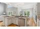 Kitchen with granite countertops, stainless steel appliances, and breakfast bar at 11040 Regal Forest Dr, Johns Creek, GA 30024
