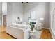 Spacious living room with high ceilings, fireplace, and hardwood floors at 11040 Regal Forest Dr, Johns Creek, GA 30024