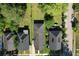 Aerial view of suburban homes with mature trees, city skyline in background at 1286 Allene Sw Ave, Atlanta, GA 30310