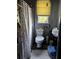 Compact bathroom with a toilet, sink, gray walls and a polka dot shower curtain at 1286 Allene Sw Ave, Atlanta, GA 30310