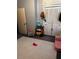 Bedroom with a pink chair and door to the next room at 1286 Allene Sw Ave, Atlanta, GA 30310