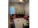 Bedroom featuring a window with curtains, area rug, storage bins and toys at 1286 Allene Sw Ave, Atlanta, GA 30310