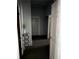 Hallway showcasing hardwood floors, doors, trim and decorative shelves at 1286 Allene Sw Ave, Atlanta, GA 30310
