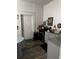 Kitchen showcasing stainless steel oven, and adjacent dining area with table at 1286 Allene Sw Ave, Atlanta, GA 30310