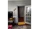 Cozy living room featuring a decorative lamp and view into the next room at 1286 Allene Sw Ave, Atlanta, GA 30310