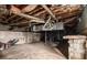 Unfinished basement shows exposed pipes and cinderblock walls at 1491 Boulderwoods Dr, Atlanta, GA 30316