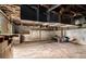 Unfinished basement space with concrete flooring and exposed ceiling with visible ductwork and insulation at 1491 Boulderwoods Dr, Atlanta, GA 30316