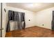 This bedroom has hardwood floors and lots of natural light coming in through the window at 1491 Boulderwoods Dr, Atlanta, GA 30316