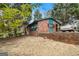 Brick home with well-kept lawn and classic architectural details at 1491 Boulderwoods Dr, Atlanta, GA 30316