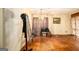 Spacious living room featuring hardwood floors and large windows allowing ample natural light at 1491 Boulderwoods Dr, Atlanta, GA 30316