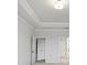 Bedroom with light gray paint, white trim and tray ceiling at 1783 Juniper Berry Way, Loganville, GA 30052