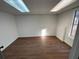 Additional room in the basement with hardwood floors, natural light and neutral paint at 3210 Linden Dr, Lawrenceville, GA 30044