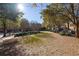 Community greenspace featuring mature trees and landscaping with sidewalks for residents at 870 Inman Village Ne Pkwy # 229, Atlanta, GA 30307